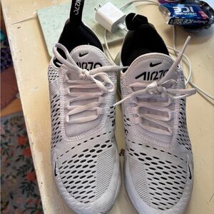 SOLD 
Nike Air Zoom White and Black Sneakers